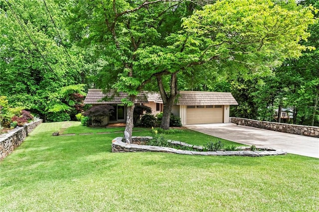 1075 Winding Branch Ln, Atlanta, GA 30338 - view of front facade with driveway, mansard roof, an attached garage, and a front yard