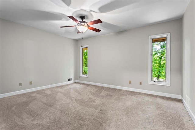 1075 Winding Branch Ln, Atlanta, GA 30338 - carpeted spare room with healthy amount of natural light, a ceiling fan, and baseboards