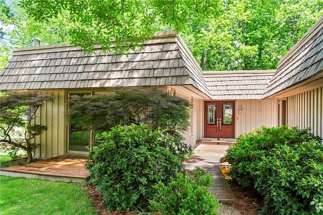 1075 Winding Branch Ln, Atlanta, GA 30338 - property entrance featuring board and batten siding and mansard roof