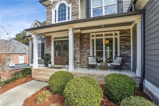 property entrance featuring covered porch