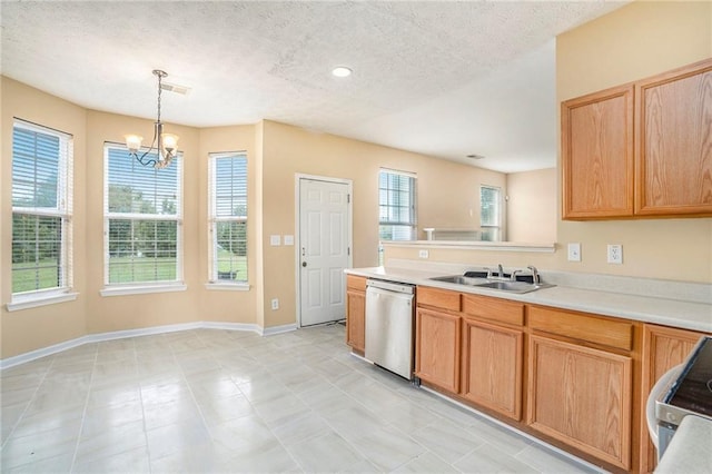 kitchen with dishwasher, light countertops, white range, pendant lighting, and a sink