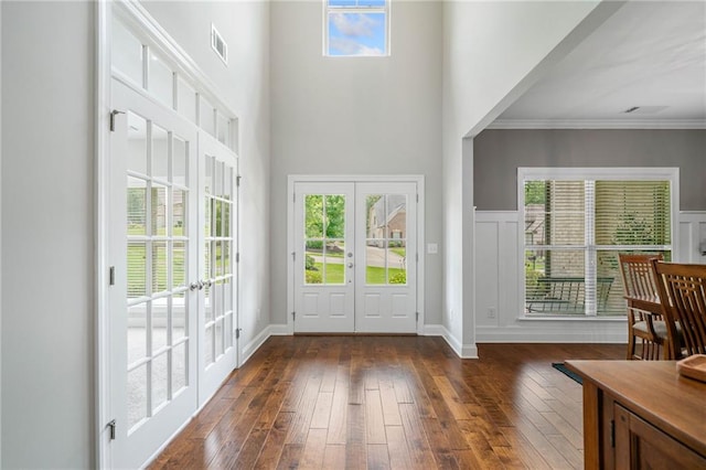 4460 Hunters Walk Way, Cumming, GA 30028 - entrance foyer with french doors, dark wood-style floors, healthy amount of natural light, a towering ceiling, and ornamental molding