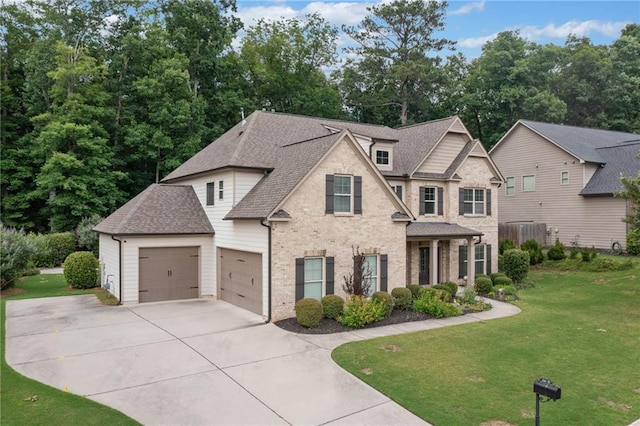 4460 Hunters Walk Way, Cumming, GA 30028 - view of front of property with concrete driveway, a front yard, brick siding, a shingled roof, and an attached garage