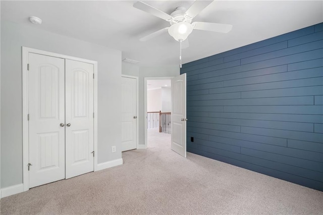 4460 Hunters Walk Way, Cumming, GA 30028 - unfurnished bedroom featuring light carpet, a closet, and ceiling fan