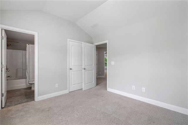 4460 Hunters Walk Way, Cumming, GA 30028 - unfurnished bedroom featuring vaulted ceiling, carpet floors, and ensuite bath