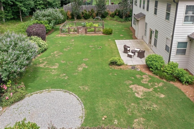 4460 Hunters Walk Way, Cumming, GA 30028 - view of yard with a vegetable garden and a patio