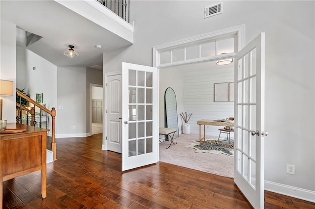 4460 Hunters Walk Way, Cumming, GA 30028 - foyer featuring french doors, stairs, wood finished floors, and a towering ceiling