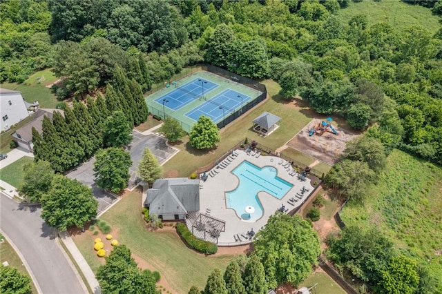 4460 Hunters Walk Way, Cumming, GA 30028 - bird's eye view of a pool and a heavily wooded area