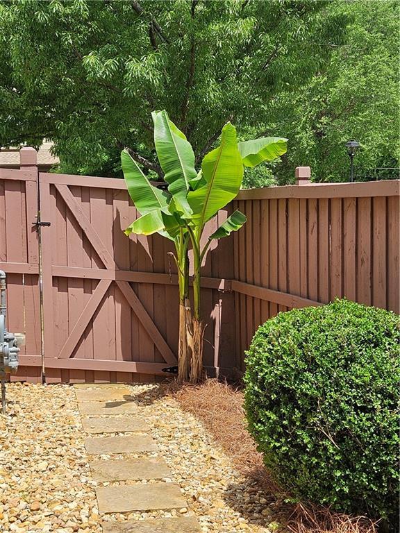 view of gate with fence