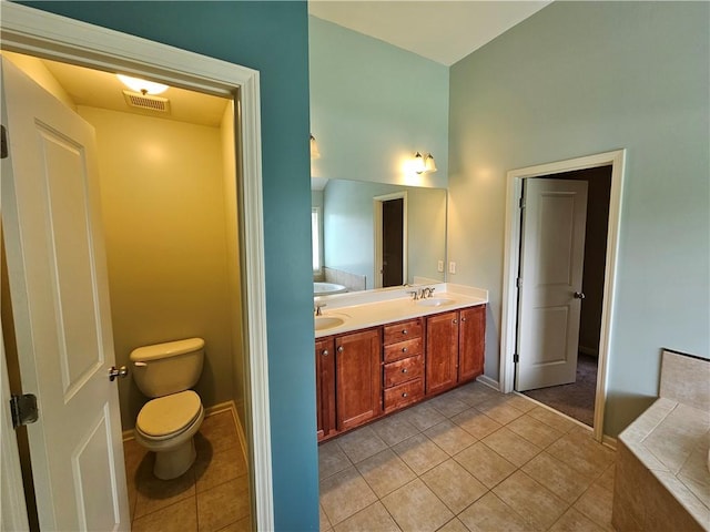 full bath with tile patterned floors, visible vents, and a sink