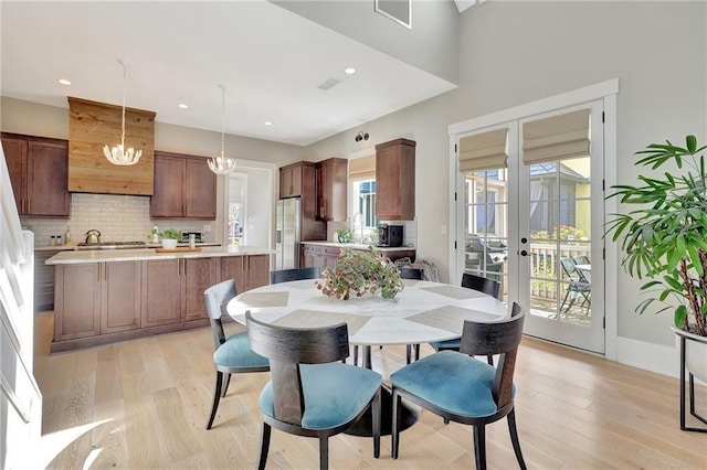 150 Ray Way, Chattahoochee Hills, GA 30268 - dining room featuring light wood-type flooring, recessed lighting, french doors, and a chandelier