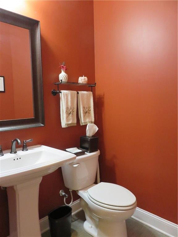 bathroom with toilet and sink