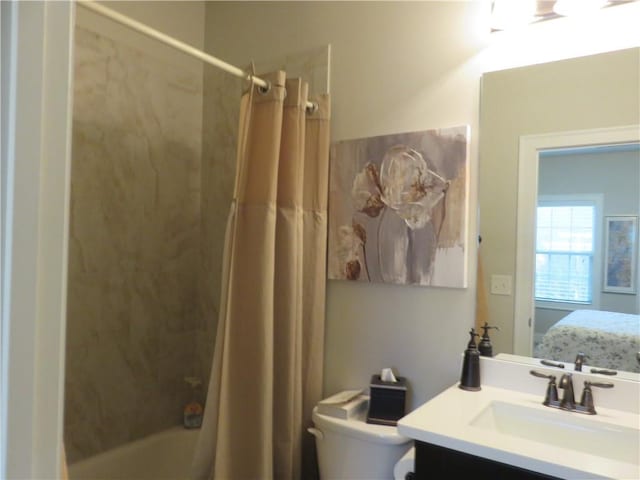 full bathroom with vanity, toilet, and shower / tub combo