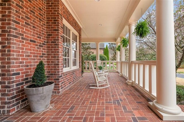 view of patio featuring a porch