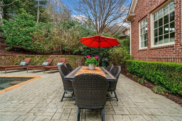 view of patio with outdoor dining space