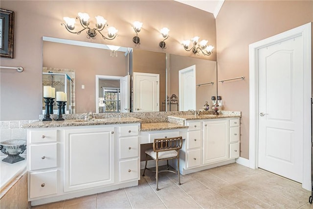 full bath with tile patterned flooring, a stall shower, and vanity