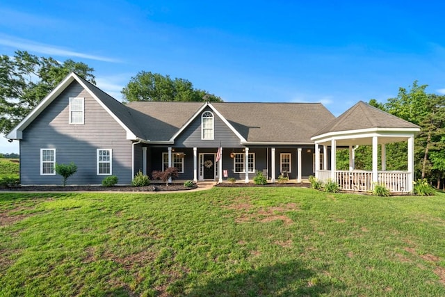 300 Olde Wick Trl, Hoschton, GA 30548 - view of front of home featuring covered porch and a front yard