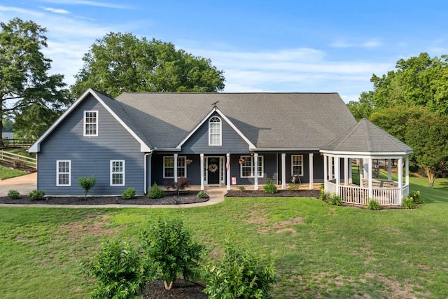 300 Olde Wick Trl, Hoschton, GA 30548 - view of front of house with a porch and a front lawn