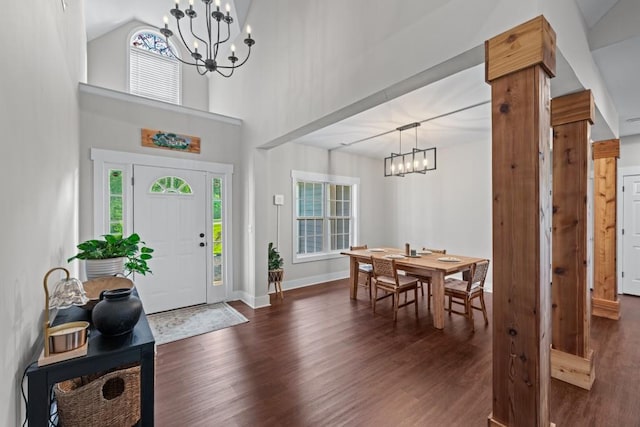 300 Olde Wick Trl, Hoschton, GA 30548 - entryway featuring a chandelier, dark wood finished floors, baseboards, and a towering ceiling