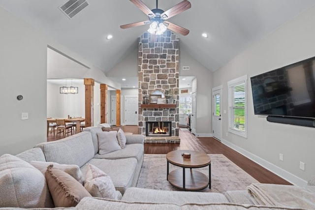 300 Olde Wick Trl, Hoschton, GA 30548 - living area featuring ceiling fan, high vaulted ceiling, wood finished floors, a fireplace, and baseboards