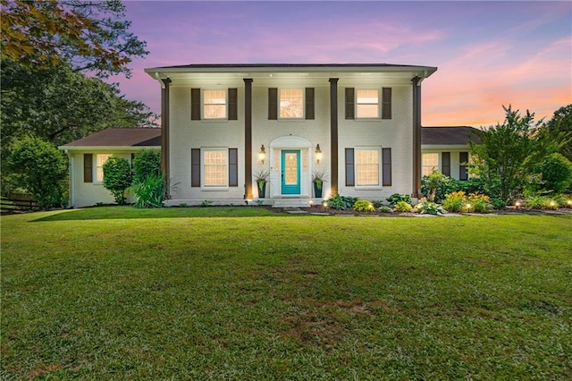 75 Auburn Rd, Auburn, GA 30011 - greek revival inspired property featuring brick siding and a front lawn