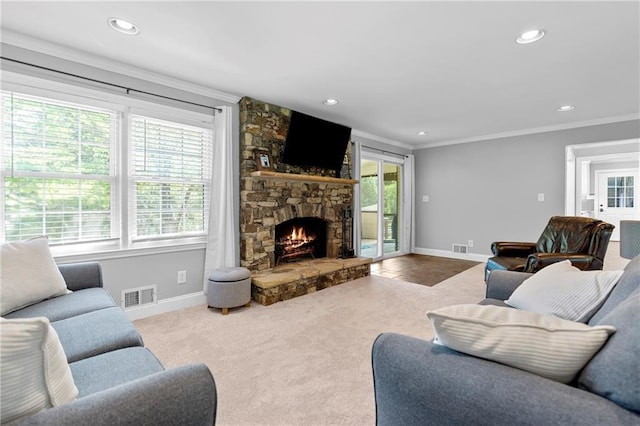 75 Auburn Rd, Auburn, GA 30011 - carpeted living area with baseboards, crown molding, recessed lighting, and a stone fireplace