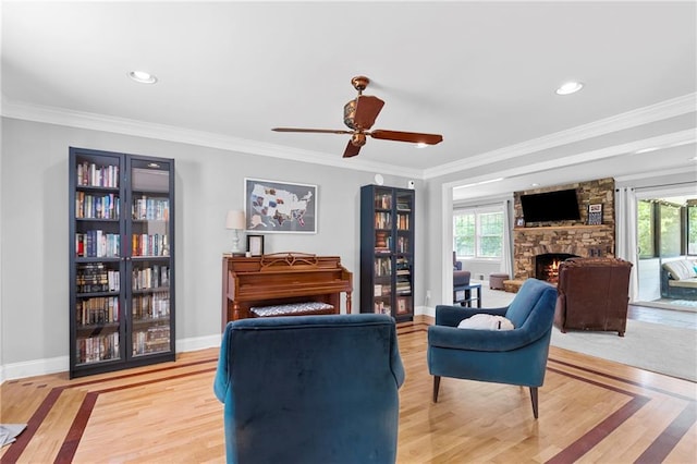 75 Auburn Rd, Auburn, GA 30011 - living room featuring plenty of natural light, a fireplace, baseboards, a ceiling fan, and ornamental molding