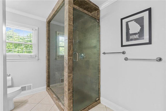 75 Auburn Rd, Auburn, GA 30011 - full bath with ornamental molding, toilet, tile patterned flooring, a shower stall, and baseboards