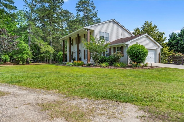 75 Auburn Rd, Auburn, GA 30011 - view of front facade with driveway, an attached garage, and a front yard