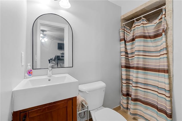 75 Auburn Rd, Auburn, GA 30011 - full bathroom featuring toilet, vanity, curtained shower, and ceiling fan