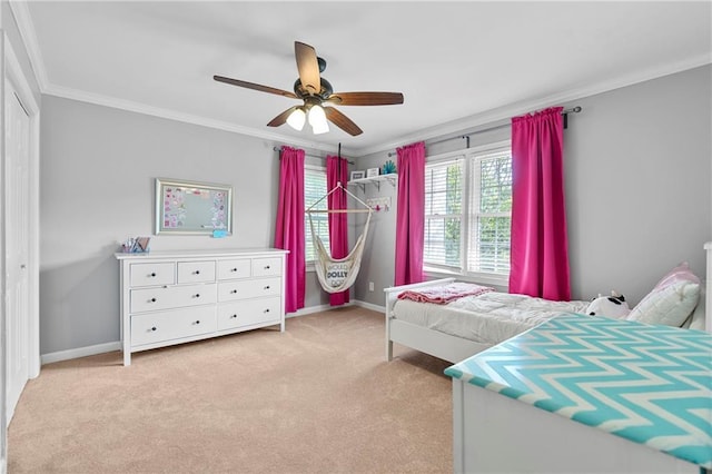 75 Auburn Rd, Auburn, GA 30011 - bedroom featuring ornamental molding, carpet floors, baseboards, ceiling fan, and a closet