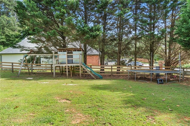 75 Auburn Rd, Auburn, GA 30011 - view of yard with a trampoline and a playground