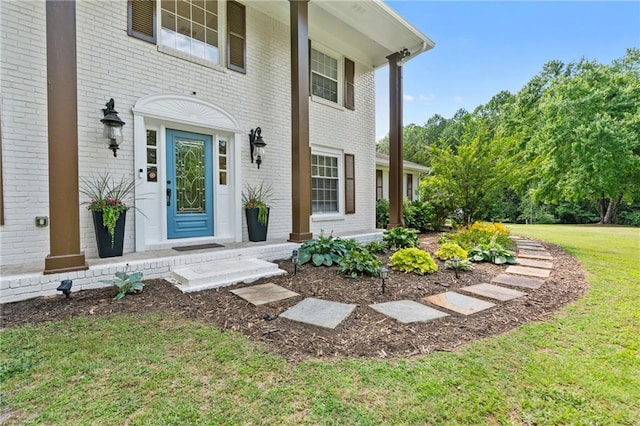75 Auburn Rd, Auburn, GA 30011 - doorway to property with brick siding and a lawn