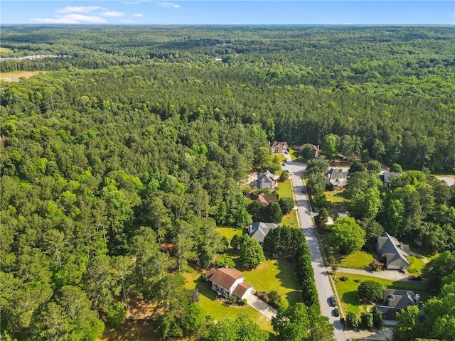 75 Auburn Rd, Auburn, GA 30011 - aerial view of property and surrounding area featuring a heavily wooded area