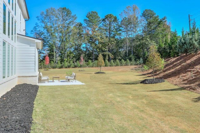 view of yard with a patio area