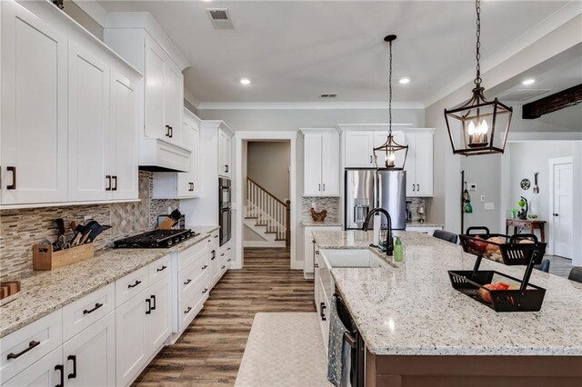 340 Taylor Path, Dallas, GA 30157 - kitchen with a spacious island, a sink, white cabinetry, dark wood-style floors, and black appliances