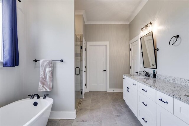 340 Taylor Path, Dallas, GA 30157 - bathroom featuring vanity, crown molding, baseboards, a shower stall, and a freestanding bath