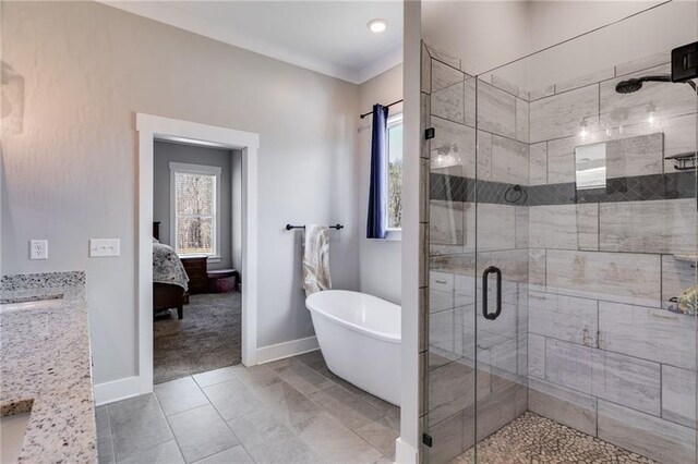 340 Taylor Path, Dallas, GA 30157 - full bathroom featuring ensuite bathroom, a soaking tub, baseboards, ornamental molding, and a stall shower