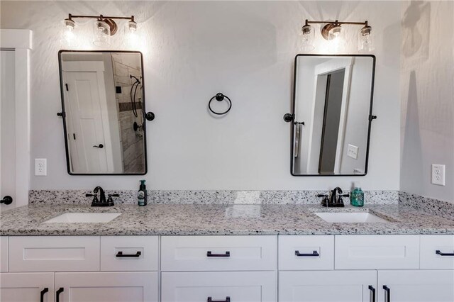 340 Taylor Path, Dallas, GA 30157 - full bath with double vanity, a sink, and a shower