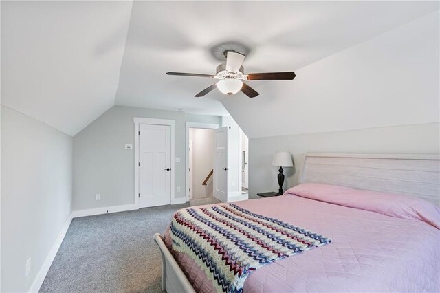 340 Taylor Path, Dallas, GA 30157 - carpeted bedroom featuring baseboards, vaulted ceiling, and ceiling fan