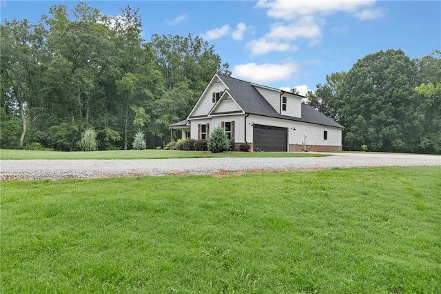 340 Taylor Path, Dallas, GA 30157 - view of home's exterior featuring driveway, roof with shingles, an attached garage, and a yard