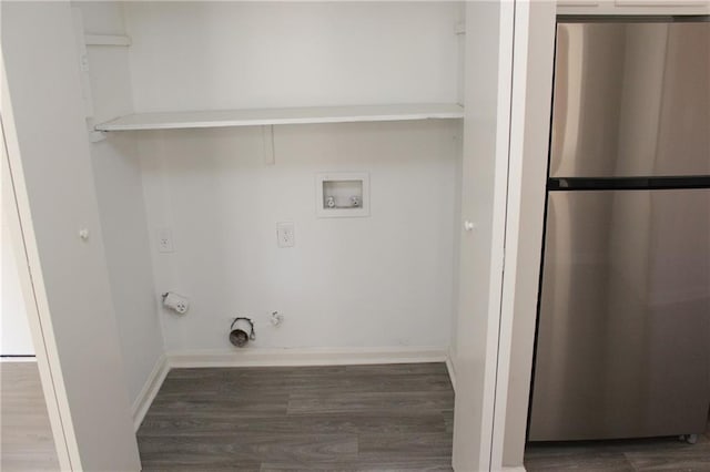 laundry room featuring hookup for a washing machine, gas dryer hookup, and dark hardwood / wood-style flooring