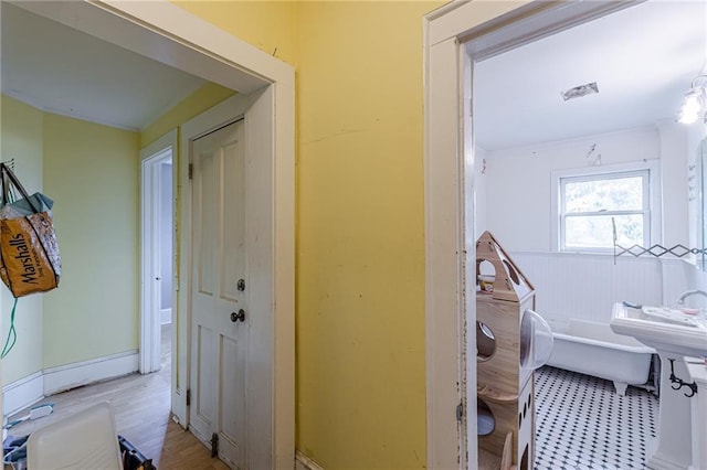 corridor with a baseboard radiator