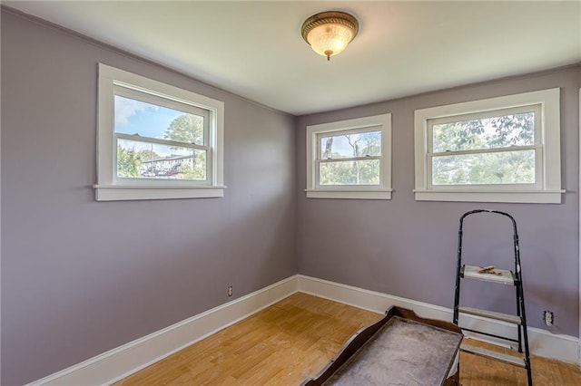 3670 Union Ave, Atlanta, GA 30354 - exercise room with baseboards and wood finished floors