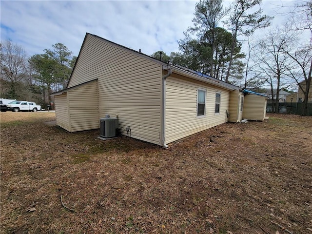 view of home's exterior featuring cooling unit