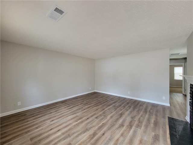 unfurnished room with light hardwood / wood-style flooring