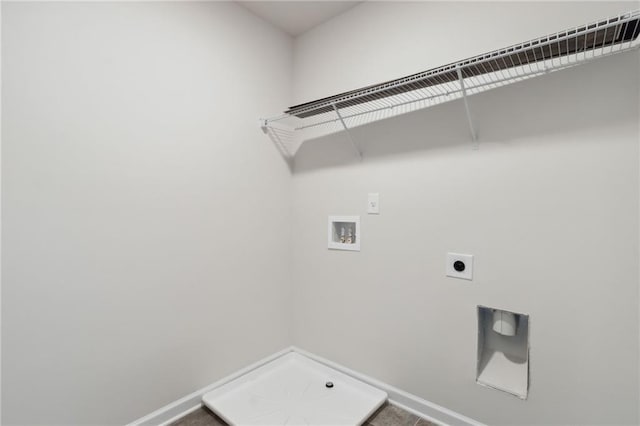 laundry area with hookup for an electric dryer, washer hookup, and tile patterned floors