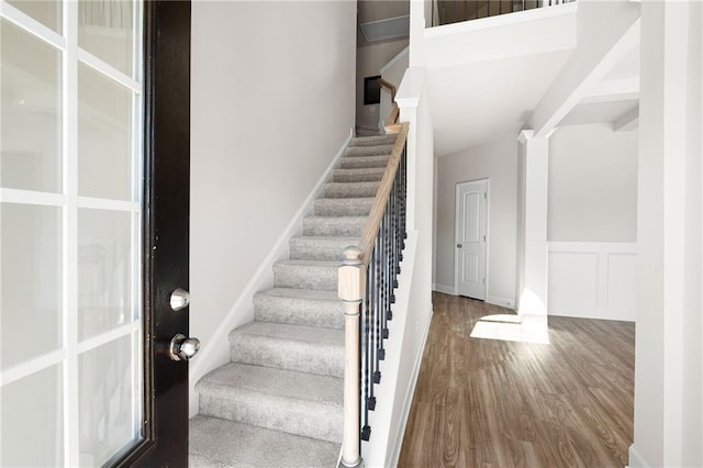 33 N Village Cir, Rydal, GA 30171 - staircase featuring wood finished floors and wainscoting