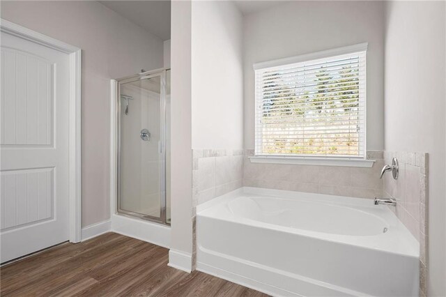 33 N Village Cir, Rydal, GA 30171 - full bathroom featuring a stall shower, wood finished floors, and a bath