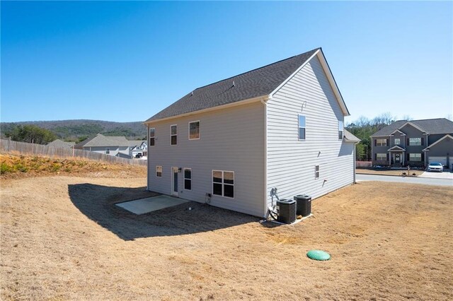 33 N Village Cir, Rydal, GA 30171 - rear view of house featuring central air condition unit and fence